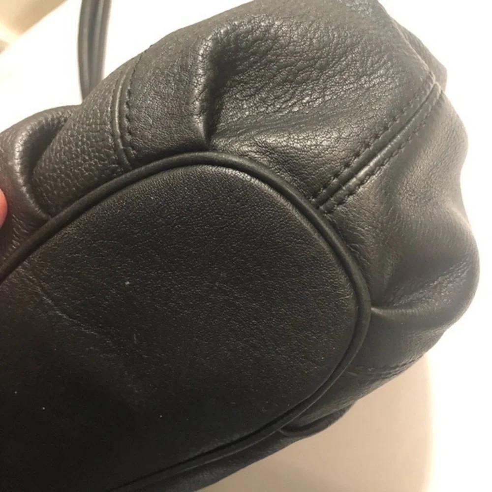 Michael kors black leather ringed tassel bag